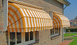 Sunshades, parasols, tents, tarpaulins