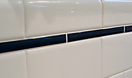Grout between ceramic wall tiles